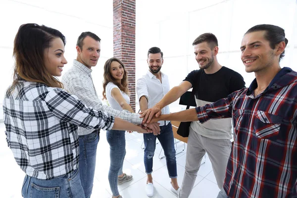 Business team with hands clasped together — Stock Photo, Image
