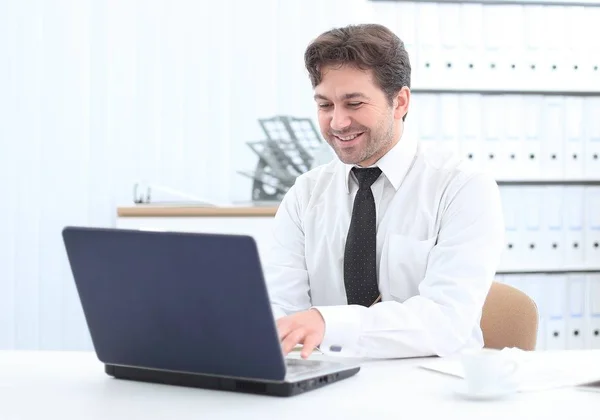 Closeup of sitting behind a Desk — Stock Photo, Image