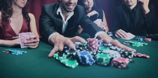 Stylish man wins in the casino — Stock Photo, Image