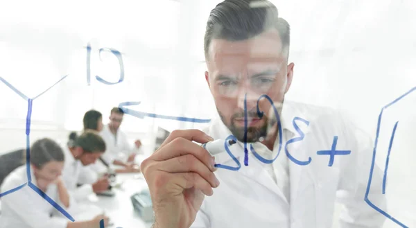 Close up of a Man scientist working with formulas — Stock Photo, Image