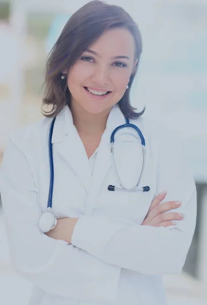 Medico medico medico donna su sfondo blu clinica. — Foto Stock