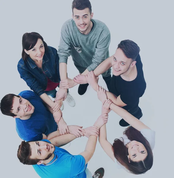 Visão superior de jovens com as mãos juntas em um círculo . — Fotografia de Stock