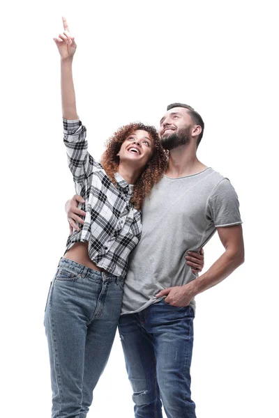 Oung casal olhando para cima e apontando para cima — Fotografia de Stock