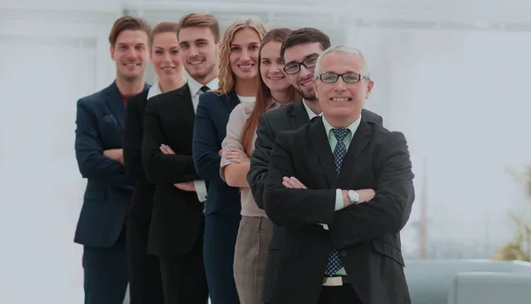 The team of the successful people with their mature boss — Stock Photo, Image