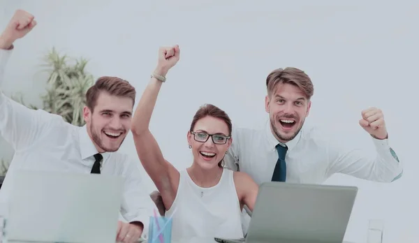 Picture of happy business team celebrating victory in office — Stock Photo, Image