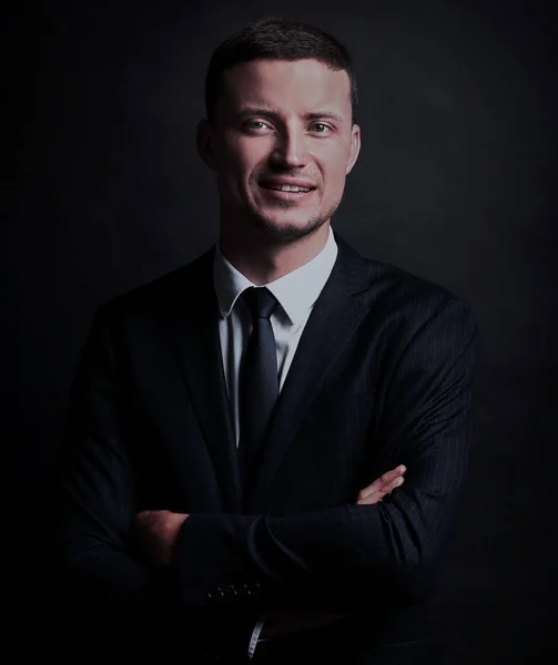 Közelről egy üzletember, fekete háttér portréja — Stock Fotó