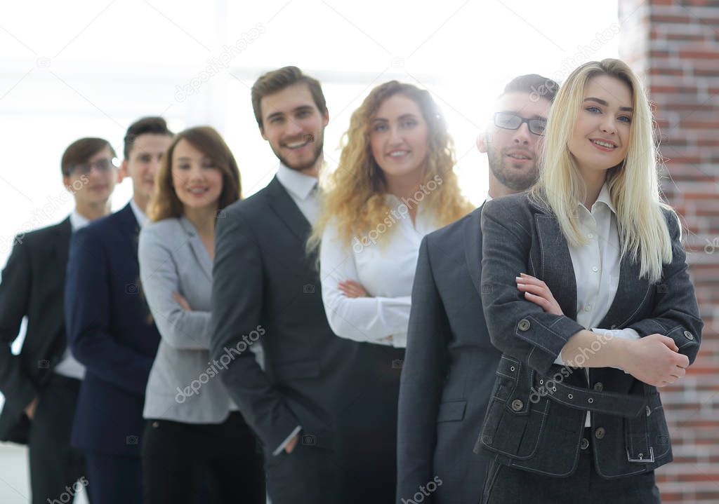 group of young business people standing in a row.