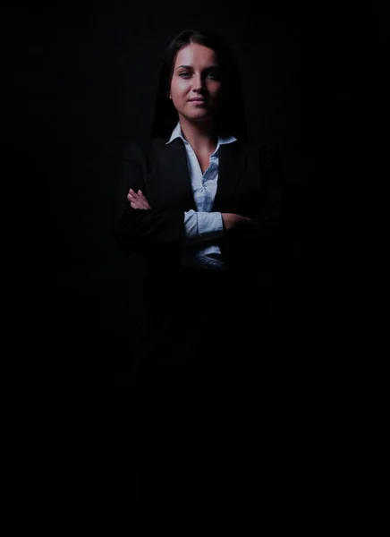 Full-length portrait of businesswoman  isolated on black backgro — Stock Photo, Image