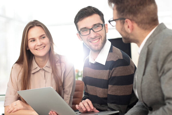 business team working on laptop