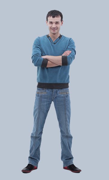 Young happy casual man portrait, isolated on gray background