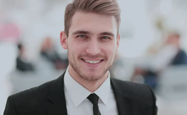 Portrait of happy businessman with  colleagues interacting on ba — Stock Photo, Image