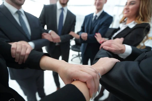Closeup. business team showing their unity — Stock Photo, Image
