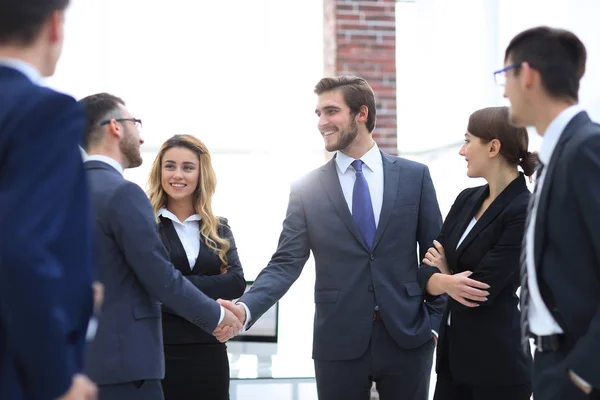 Business handshake of businessmen in the office — Stock Photo, Image