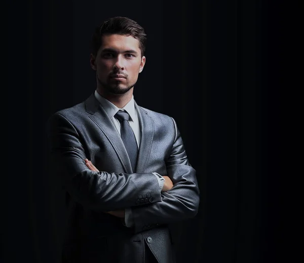 Handsome businessman isolated on black — Stock Photo, Image