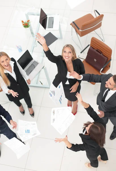 View from the top.business team throwing work documents.t — Stock Photo, Image