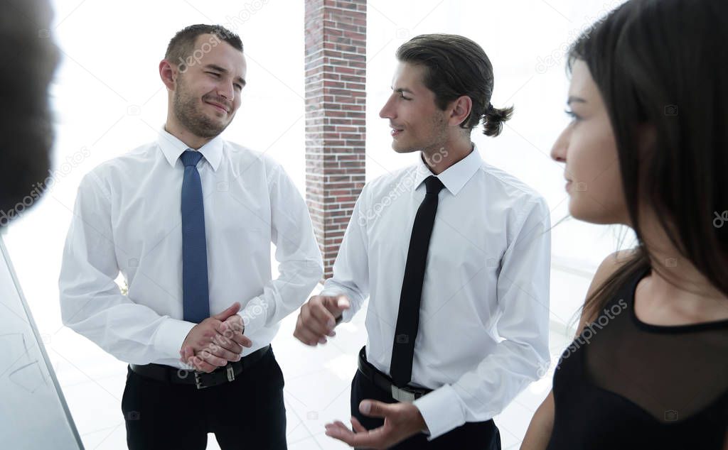 closeup of a business team discussing the current issues