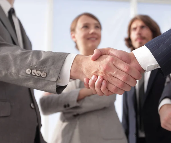 Welcome and handshake business people — Stock Photo, Image