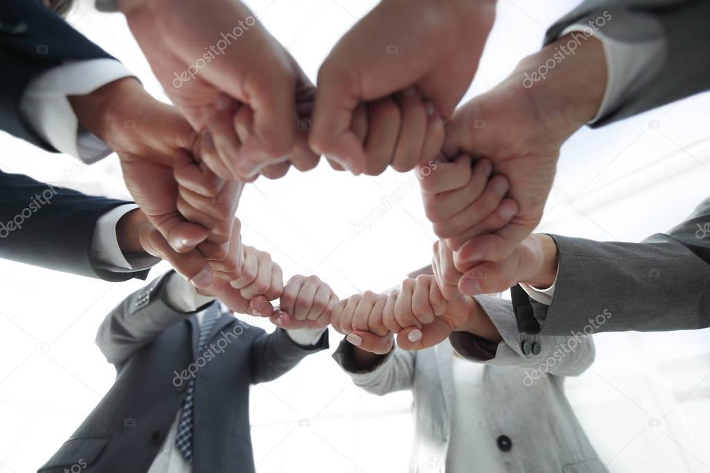 group of people joined their hands