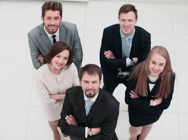 Business colleagues looking at camera in the office — Stock Photo, Image