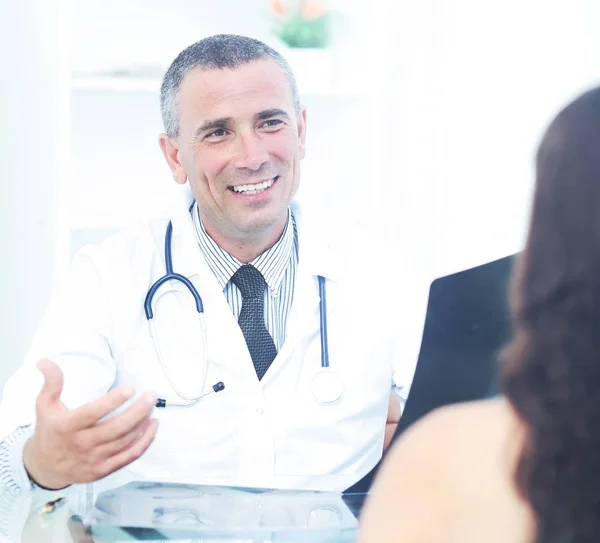 family doctor counsels the patient and discusses with her the re