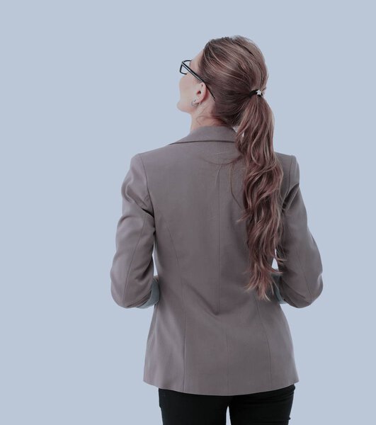 Full-length back side of businesswoman, isolated on white.