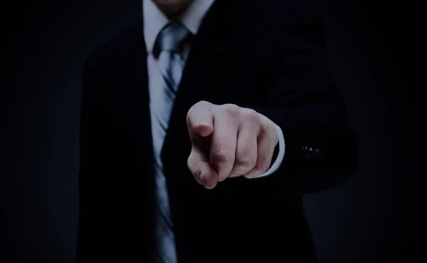 Man with interface in futuristic interior — Stock Photo, Image