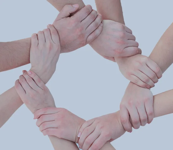 Empresários unindo as mãos em um círculo no escritório — Fotografia de Stock