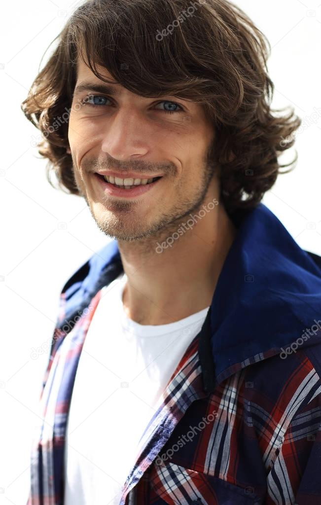 portrait. stylish guy in a plaid shirt. close-up.