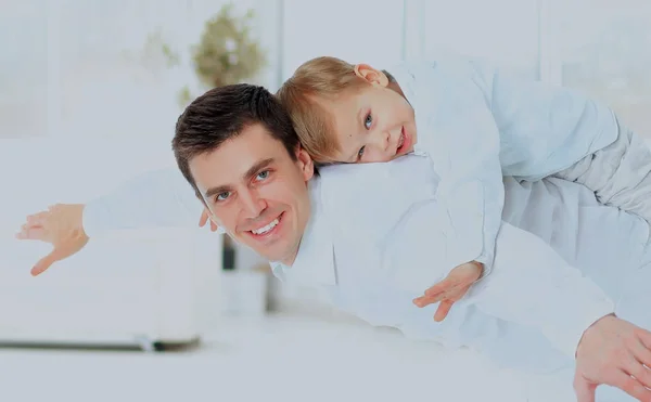 Father and son imitate plane. — Stock Photo, Image