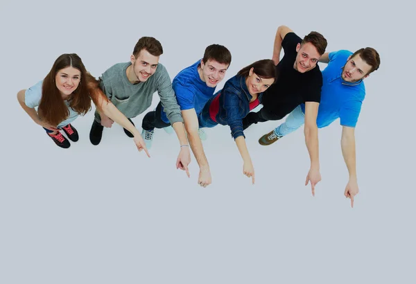 Grupo de jovens apontando para algo . — Fotografia de Stock