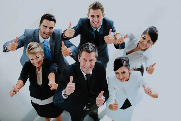 Top view of executives smiling and pointing. — Stock Photo, Image