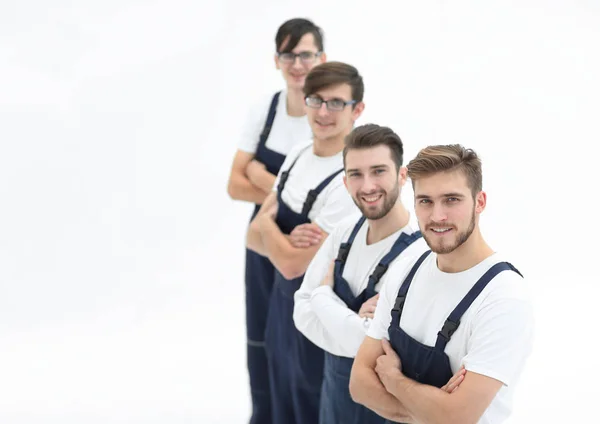 Équipe joyeuse de déménageurs responsables isolés sur fond blanc — Photo