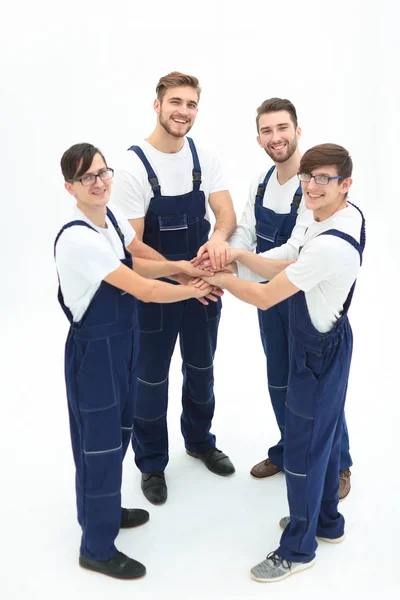 Equipe de movers juntando as mãos . — Fotografia de Stock