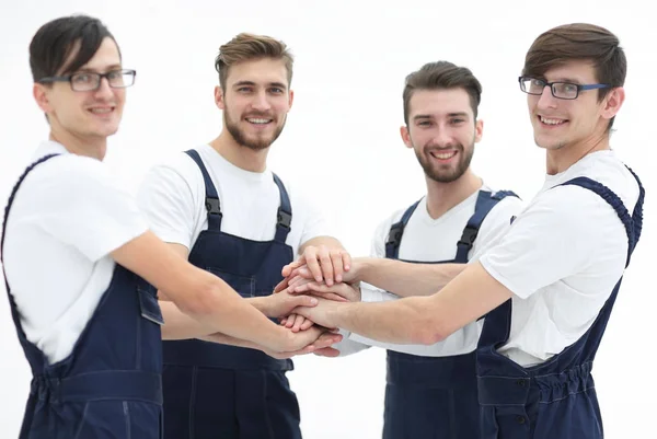 Equipe de movers juntando as mãos . — Fotografia de Stock