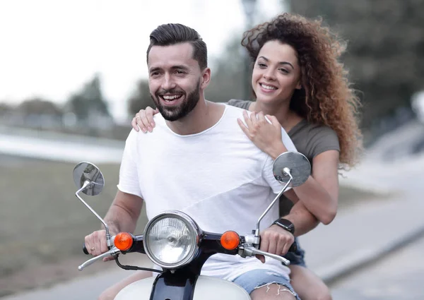 Happy couple driving scooter excited on summer holidays vacation — Stock Photo, Image