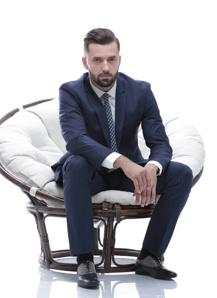Empresário sentado em uma cadeira confortável — Fotografia de Stock
