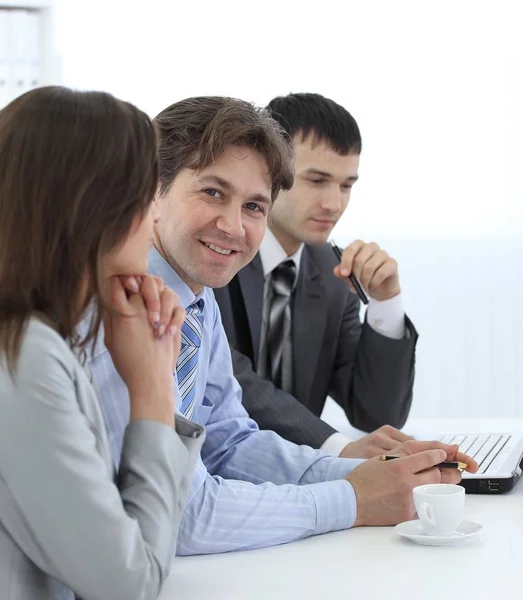 Head of business team sitting at Desk — Stock Photo, Image