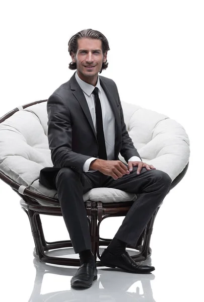 Uomo d'affari seduto su una comoda sedia grande — Foto Stock