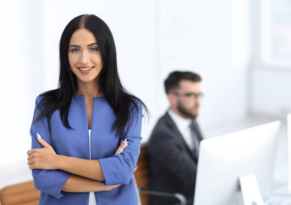 Successful young business woman with charming confident smile