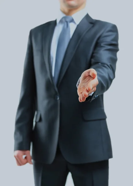 Businessman giving his hand for a handshake. — Stock Photo, Image
