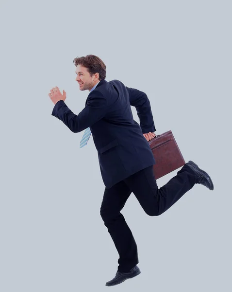 Молодий бізнесмен бігає ізольовано на білому тлі — стокове фото
