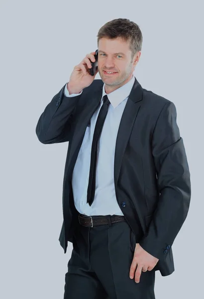 Porträt eines Geschäftsmannes mit Telefon isoliert auf weiß. — Stockfoto