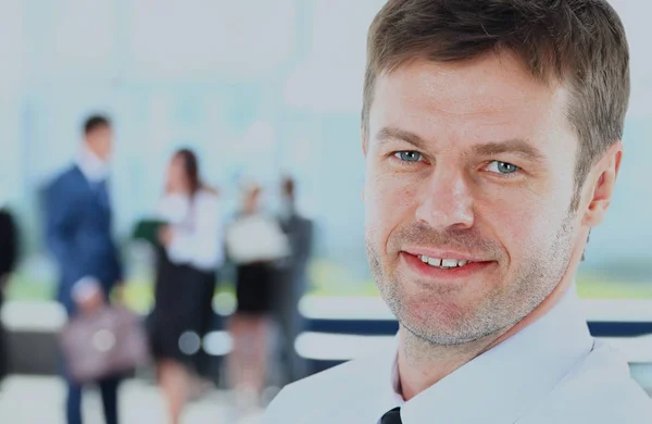 Erfolgreicher Geschäftsmann im Büro. — Stockfoto