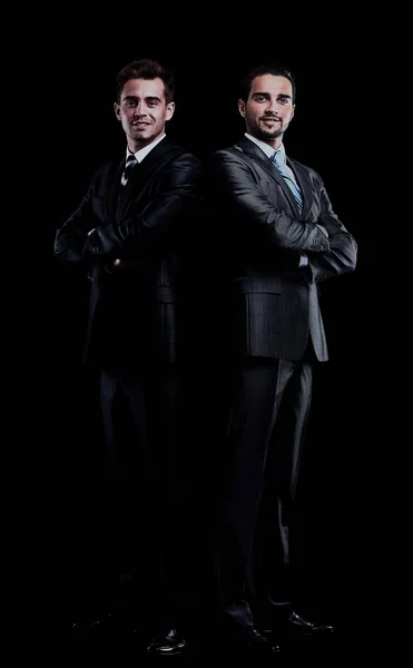 Δύο επιχειρηματίες, απομονωμένο, πάνω από το μαύρο φόντο. — Φωτογραφία Αρχείου