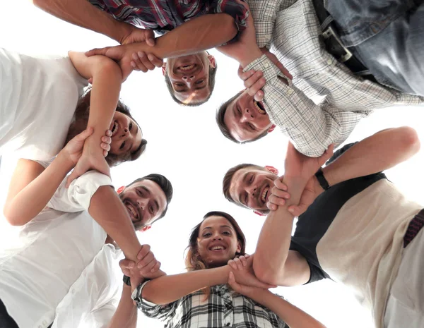 Glückliche Gruppe von Geschäftsleuten, die in Zusammenarbeit ihre Hände stapeln — Stockfoto