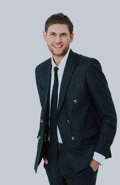 onun elleri ceplerinde duran genç iş adamı.