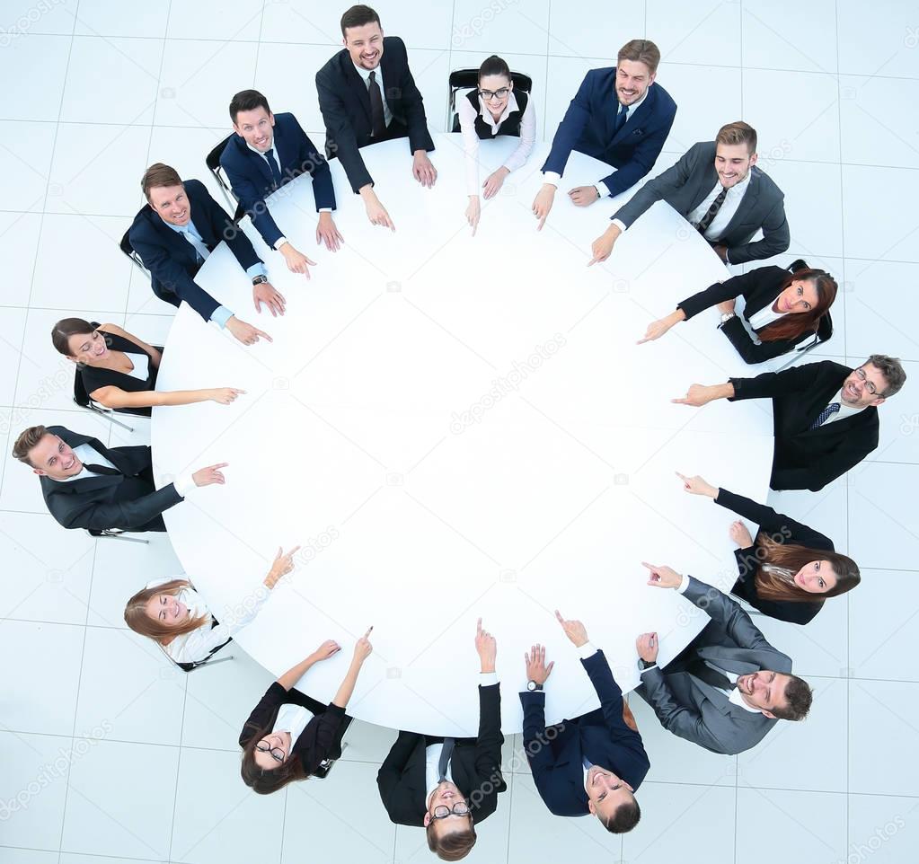 group of business people sitting at the round table. the business concept