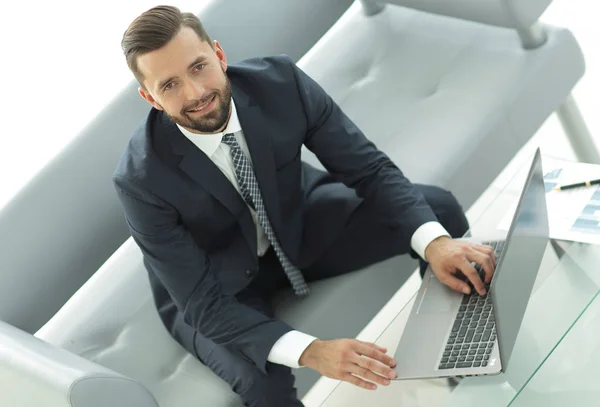 Top view of businessman working on laptop in office — Stock Photo, Image