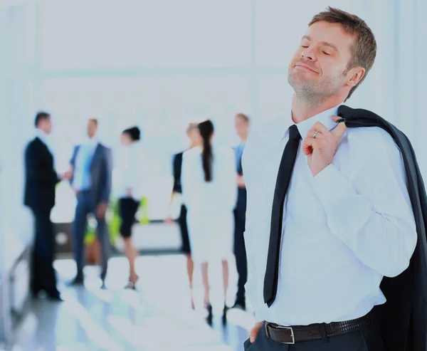 Happy young business man relaxing. — Stock Photo, Image