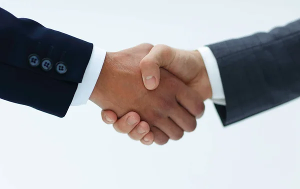 Closeup of business people shaking hands over a deal — Stock Photo, Image